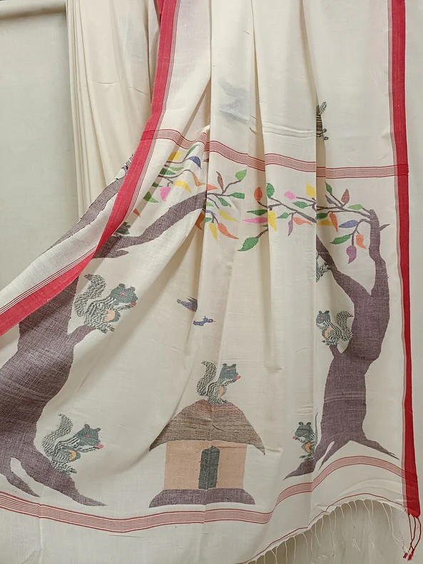 Hand-painted saree featuring nature-inspired artwork and floral elements